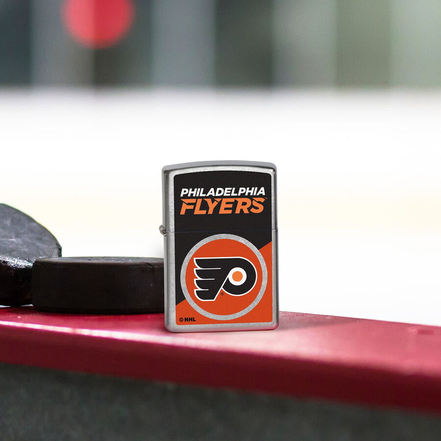 diseño de logotipo con bloques de color de los philadelphia flyers