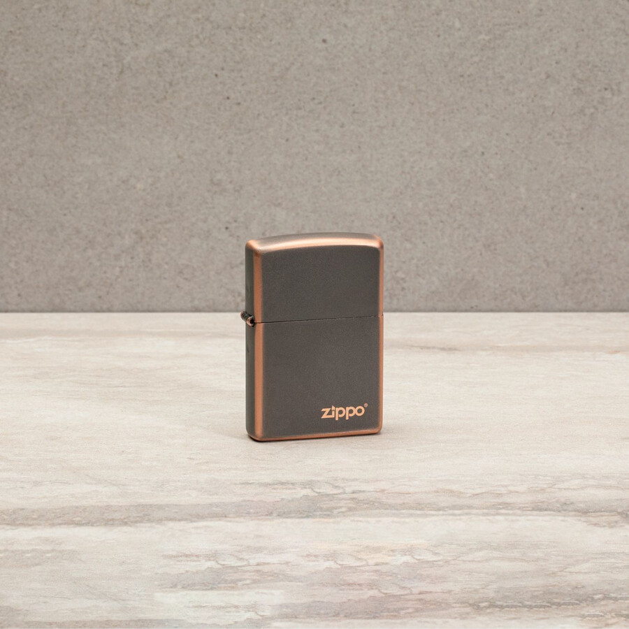 logotipo zippo de bronce rústico